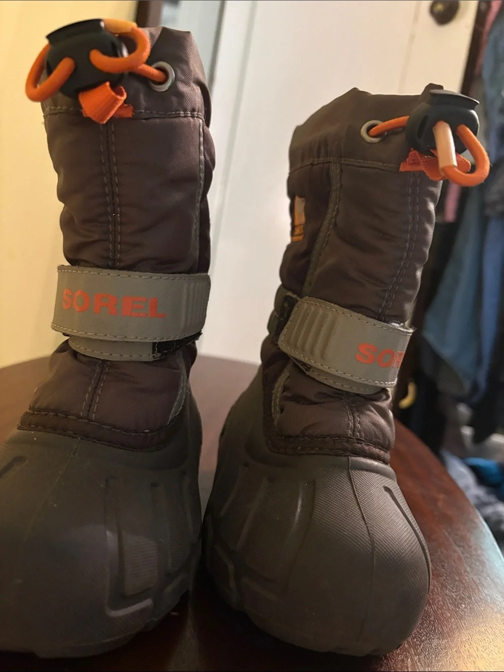 Sorel Brown Kids Winter Boots with Orange Accents